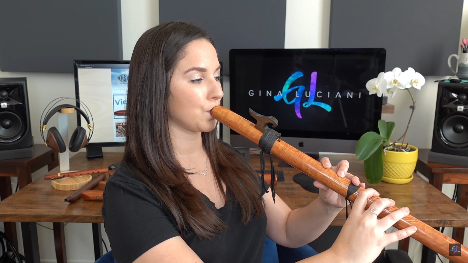 girl playing wooden flute